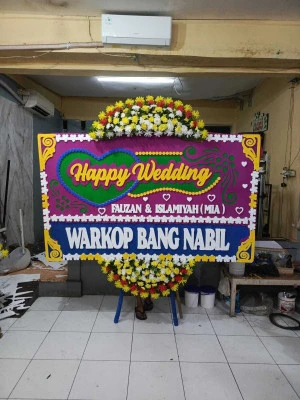 Papan Bunga di Kresek